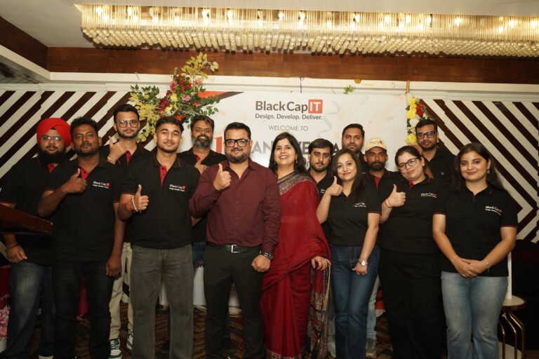 Black Cap IT development team celebrating together at a company event